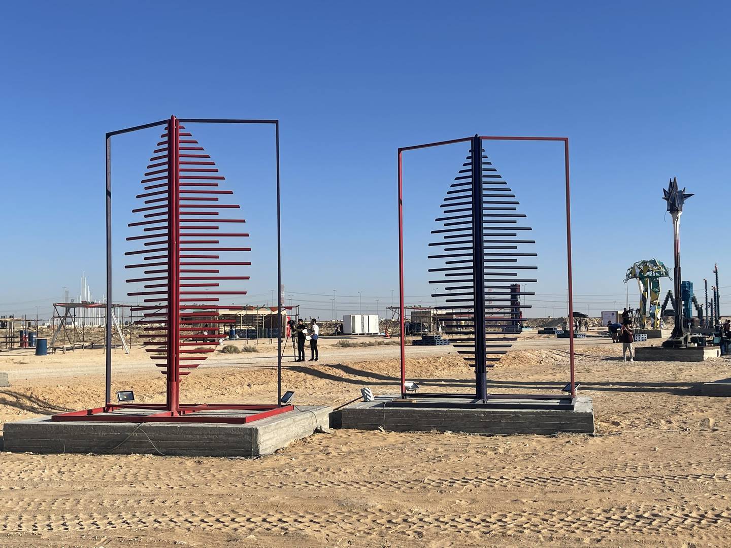 A pair of metal installations at the sustainability-focused Alamein Art Festival. Photo: Kamal Tabikha / The National