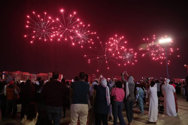 Residents and visitors turned out in large numbers to see the fireworks at Yas Bay.  Pawan Singh / The National