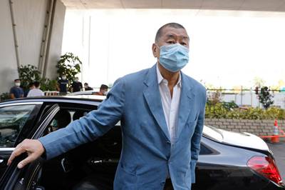 FILE PHOTO: Media mogul Jimmy Lai Chee-ying, founder of Apple Daily arrives at West Kowloon Courts to face charges related to an illegal vigil assembly commemorating the 1989 Tiananmen Square crackdown, in Hong Kong, China October 15, 2020. REUTERS/Tyrone Siu/File Photo
