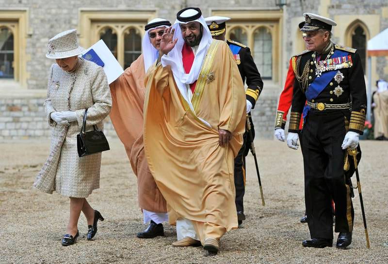 Queen Elizabeth, the President of the United Arab Emirates, Sheikh Khalifa bin Zayed bin Sultan Al Nahyan and the Duke of Edinburgh leave following the inspection of the Guard of Honour at Windsor Castle, as he begins a State Visit to the UK Tuesday April 30, 2013. (AP Photo/Toby Melville, Pool) *** Local Caption ***  Britain Royals UAE.JPEG-06e1c.jpg
