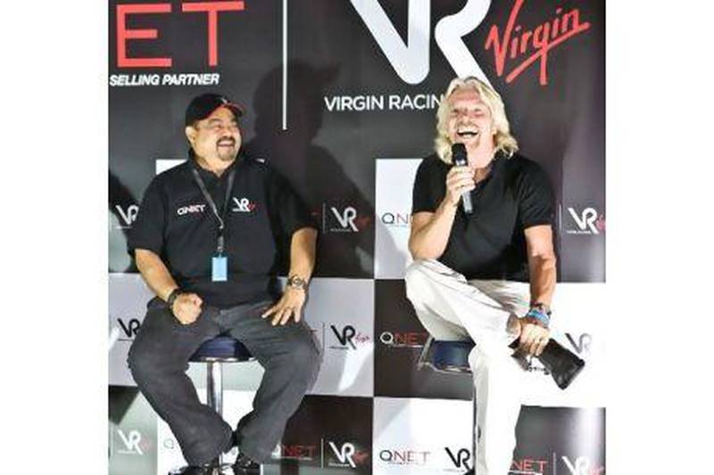 Richard Branson, right, with Vijay Eswaran, the executive chairman of the QI Group, at Yas Marina in 2010.