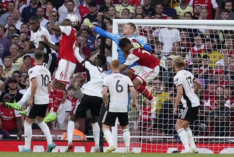 Arsenal's Gabriel, centre left, scores his side's second goal against Fulham at the Emirates Stadium. AP