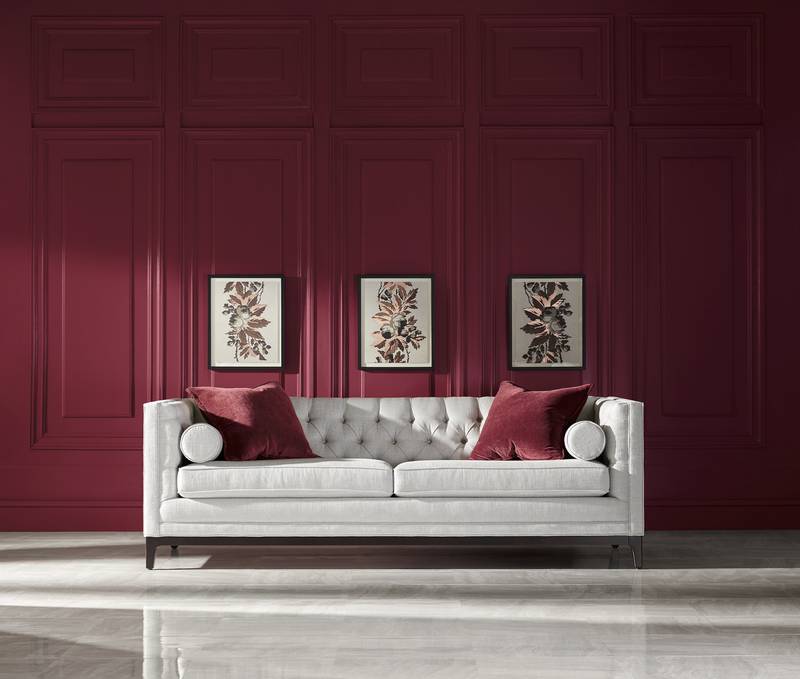 Don't be afraid to embrace bold colours and dark tones, including Pantone's shade of 2023 Viva Mangenta, in the coming year. Photo: Ethan Allen