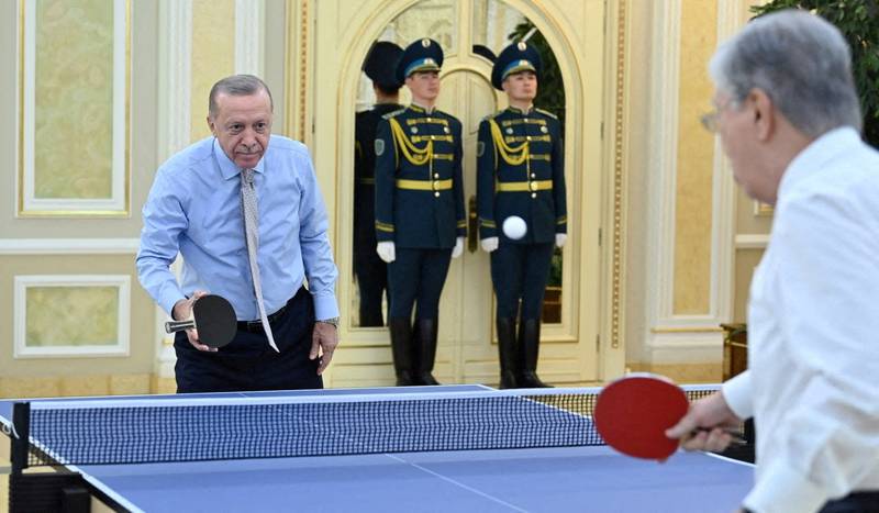 Kazakhstan's President Kassym-Jomart Tokayev and his Turkish counterpart Recep Tayyip Erdogan play table tennis in Astana, Kazakhstan. Reuters