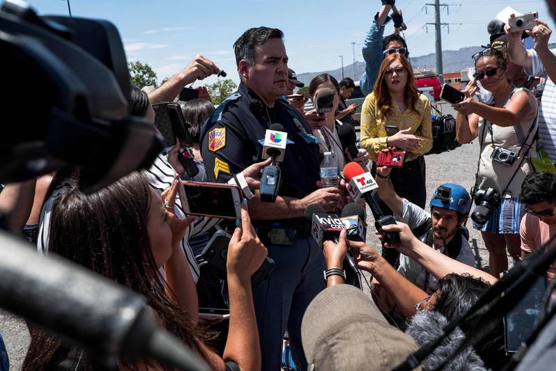 El Paso Police Department Sgt. Robert Gomez briefs media on the shooting. AFP