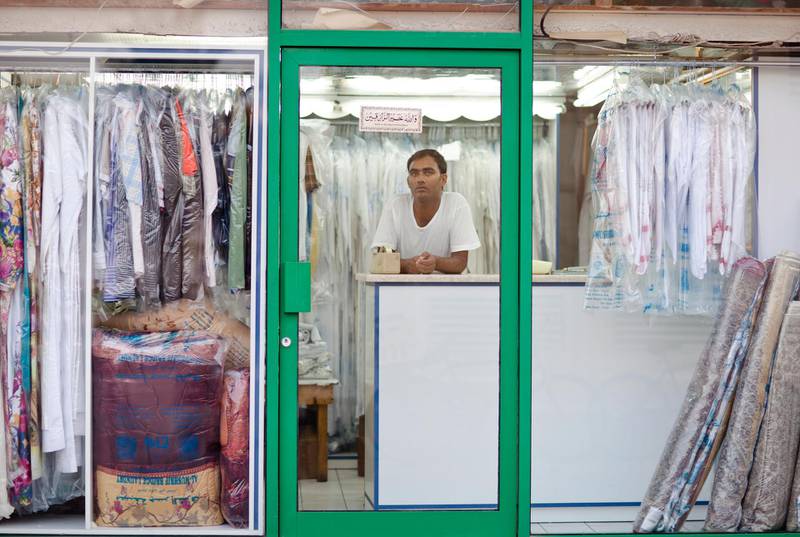 Abu Dhabi - August 24, 2010:  A laundry shop in the HH Neigh Al Tabbiyah neighborhood. Lauren Lancaster / The National