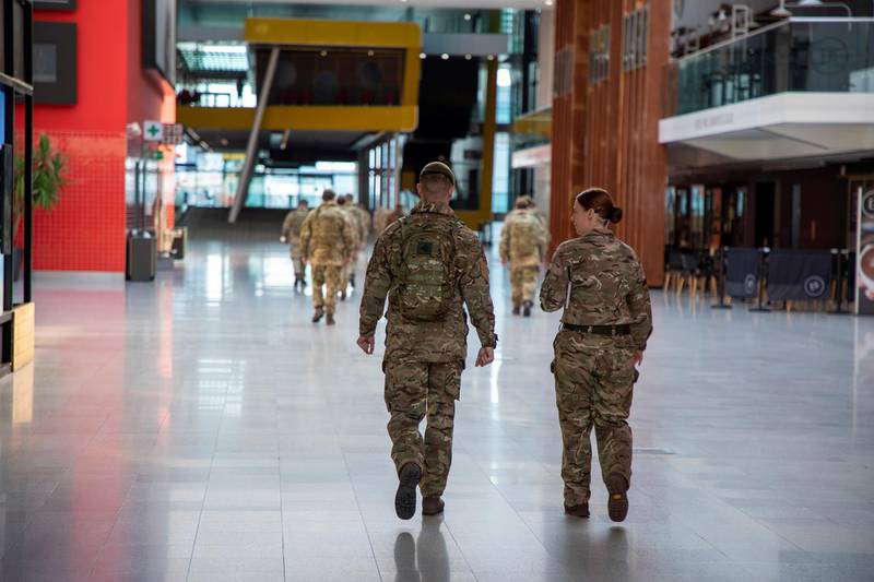 Soldiers from 1 Royal Anglian Regiment arrive at the Excel Centre to build the new NHS Nightingale Hospital.  Courtesy Reuters