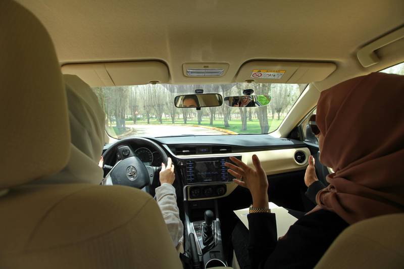 An instructor guides her trainee in driving skills during a training drive at the Saudi Aramco driving school for women at the headquarters of the Saudi Arabian Oil Co. in Dhahran, Saudi Arabia, on Tuesday, June 12, 2018. As Saudi Arabia joins every other country in the world in allowing women to drive on June 24, oil giant Saudi Aramco has set up a facility to train thousands of employees and their female dependents the ins and outs. Photographer: Mohammed Al-Nemer/Bloomberg