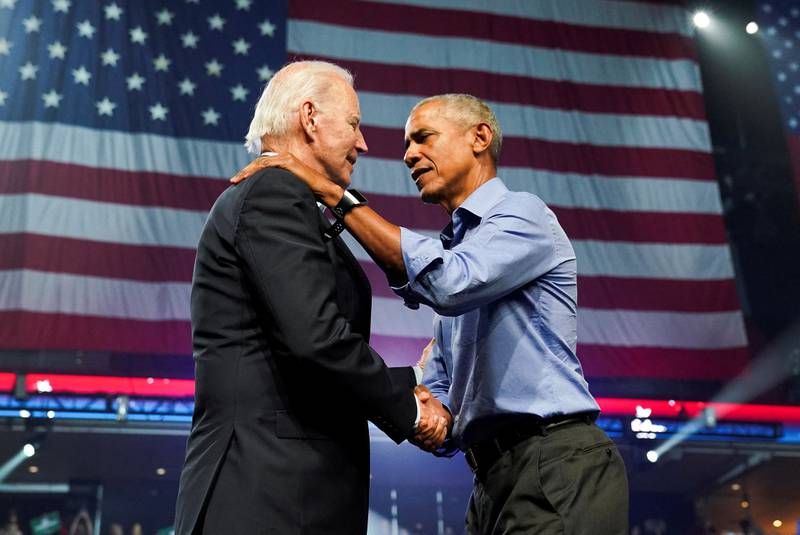US President Joe Biden and former president Barack Obama attend a campaign event for Democratic candidates in Philadelphia. Reuters