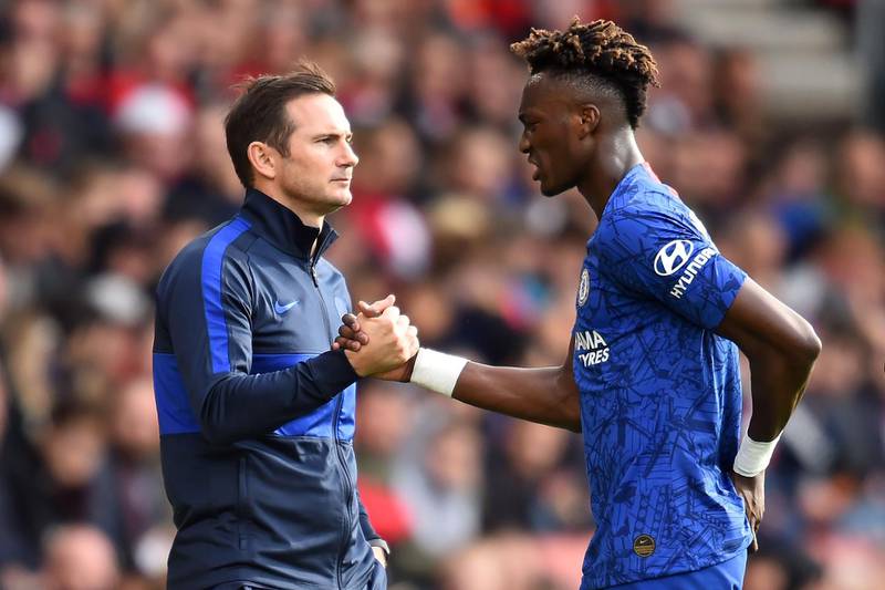 (FILES) In this file photo taken on October 06, 2019 Chelsea's English head coach Frank Lampard (L) shakes hands with Chelsea's English striker Tammy Abraham as he's substituted during the English Premier League football match between Southampton and Chelsea at St Mary's Stadium in Southampton, southern England. Chelsea's young guns will test their run of form at one of the homes of youth development on Wednesday as they attempt to stop an Ajax team on course to replicate last season's thrilling Champions League run. - RESTRICTED TO EDITORIAL USE. No use with unauthorized audio, video, data, fixture lists, club/league logos or 'live' services. Online in-match use limited to 120 images. An additional 40 images may be used in extra time. No video emulation. Social media in-match use limited to 120 images. An additional 40 images may be used in extra time. No use in betting publications, games or single club/league/player publications.
 / AFP / Glyn KIRK                   / RESTRICTED TO EDITORIAL USE. No use with unauthorized audio, video, data, fixture lists, club/league logos or 'live' services. Online in-match use limited to 120 images. An additional 40 images may be used in extra time. No video emulation. Social media in-match use limited to 120 images. An additional 40 images may be used in extra time. No use in betting publications, games or single club/league/player publications.
