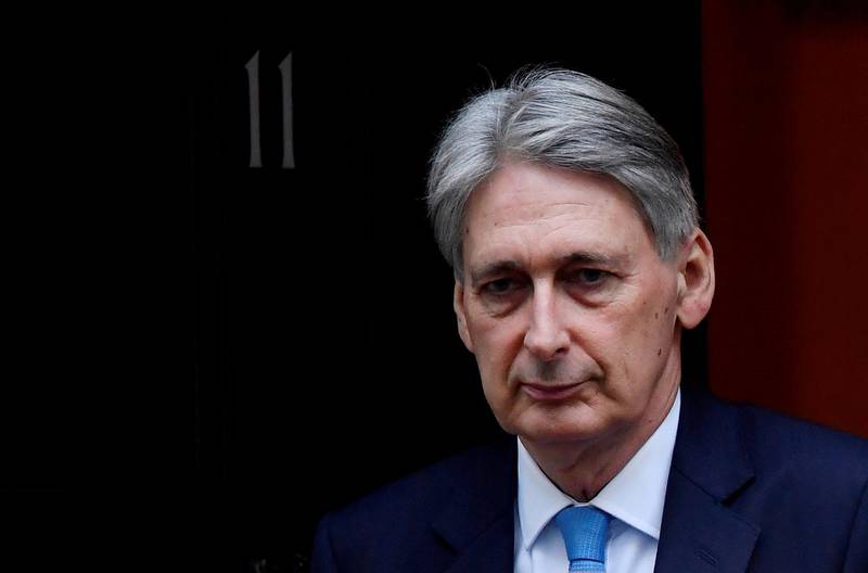 FILE PHOTO: Britain's Chancellor of the Exchequer Philip Hammond is seen outside Downing Street in London, Britain January 30, 2019. REUTERS/Toby Melville/File Photo