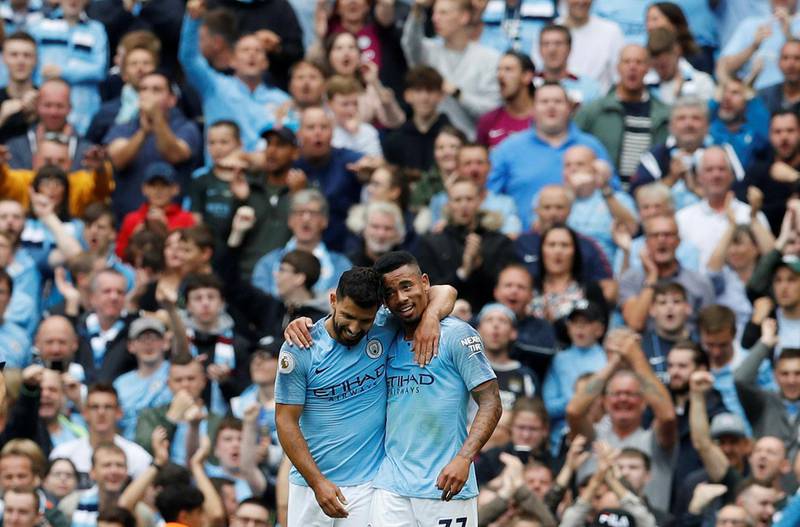 Manchester City's Sergio Aguero celebrates scoring their first goal with Gabriel Jesus. Reuters