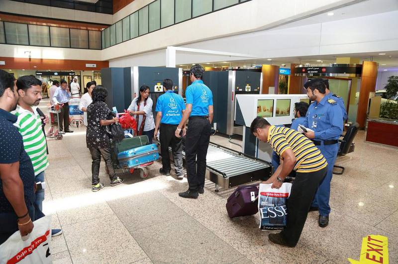 Dubai Customs officers carry out routine searches of travellers at Dubai International Airport. Courtesy: WAM 