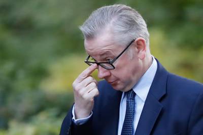 Britain's Environment, Food and Rural Affairs Secretary Michael Gove arrives to attend the weekly meeting of the cabinet in Downing Street in London on October 9, 2018. / AFP / Tolga AKMEN
