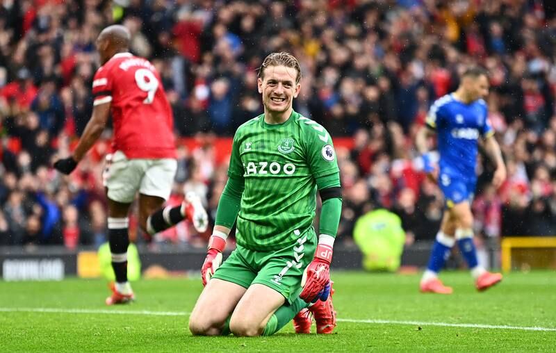 Everton goalkeeper Jordan Pickford reacts as Anthony Martial runs off in celebration after scoring. Getty