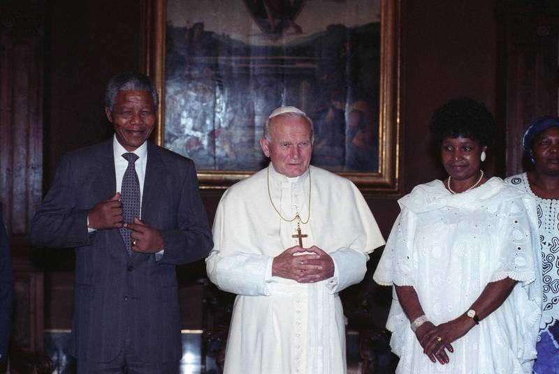 Pope John Paul meets with Nelson Mandela and his wife Winnie at the Vatican June 15, 1990.  Mandela is mid-way through a tour aimed at persuading governments to maintain sanctions against South Africa until apartheid is abolished.  Reuters/Luciano Mellace