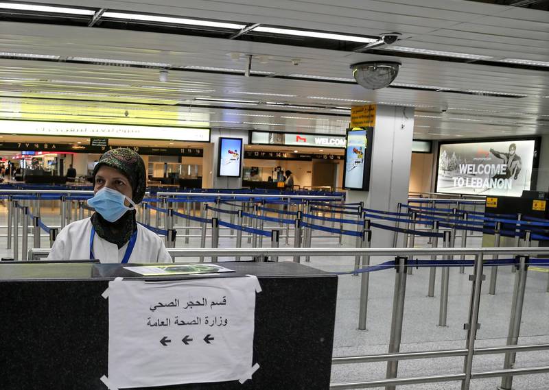 A member of medical team waits at an empty arrival terminal at the Rafik Hariri International Airport in Beirut, Lebanon, 09 March 2020. EPA