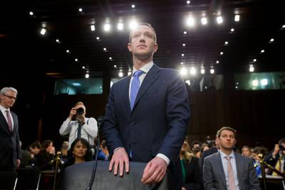 Facebook CEO Mark Zuckerberg takes his seat following a break in testifying before the Senate Commerce, Science and Transportation Committee and the Senate Judiciary Committee. Michael Reynolds / EPA