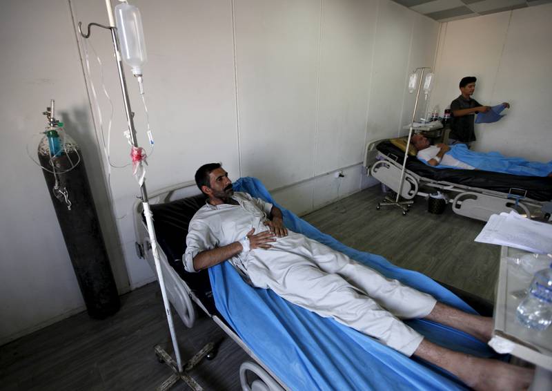 An Iraqi man suffering from cholera waits for medical treatment at a hospital in Baghdad, September 21, 2015. Reuters