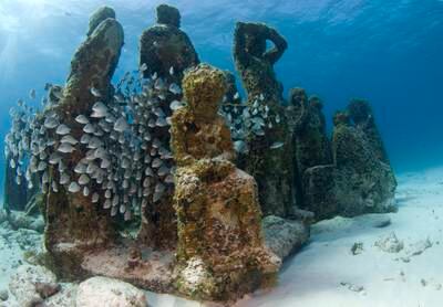 One of the largest underwater museums in the world is in the Caribbean Sea off Cancun, Mexico. AP Images