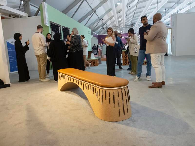 The bench is made out of recycled cork materials, camel leather and palm pellets. 