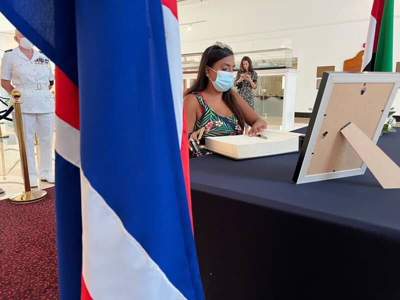 Residents are invited to visit the 'QE2' in Port Rashid to sign the book of condolences. 