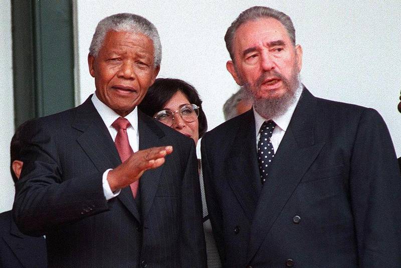 Cuban president Fidel Castro, right, and South African president Nelson Mandela during the Non-Aligned Movement summit in Durban in September 1998. Anna Ziemenski / AFP