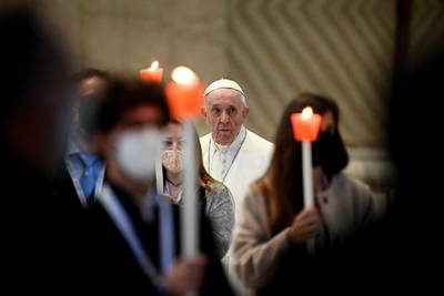 Pope Francis leads a rosary prayer at the start of May as a month of daily services begin at churches around the world for the end of coronavirus pandemic, at the Vatican City, on May 1, 2021. Reuters
