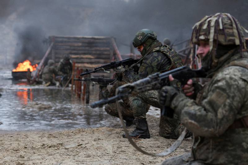 Ukrainian soldiers take part in a military drill on psychological combat training close to the border with Belarus. Reuters