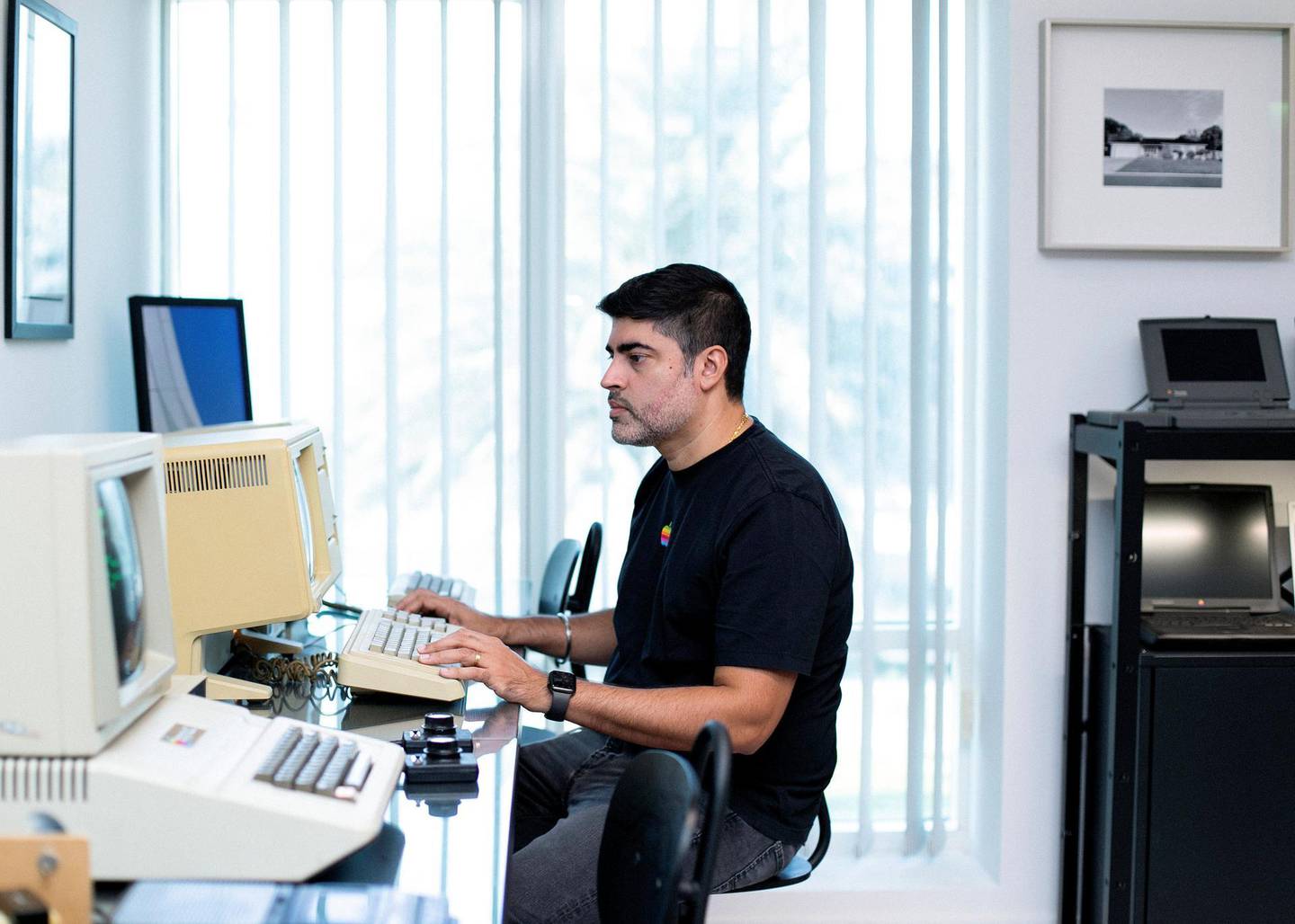 DUBAI, UNITED ARAB EMIRATES. 3 NOVEMBER 2019. Apple product collector, Jimmy Grewal works on a Apple Lisa.Jimmy Grewal previously worked as the Program Manager on Microsoft's Mac Internet Explorer team and is currently a director of Elcome International.(Photo: Reem Mohammed/The National)Reporter:Section: