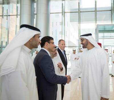 ABU DHABI, UNITED ARAB EMIRATES - June 15, 2014: HH General Sheikh Mohamed bin Zayed Al Nahyan Crown Prince of Abu Dhabi and Deputy Supreme Commander of the UAE Armed Forces (R) greets Marc Harrison, MD, Chief Executive Officer of the Cleveland Clinic Abu Dhabi (2nd L) upon his arrival at the Cleveland Clinic Abu Dhabi in Al Maryah Island. Seen with Suhail Al Ansari Executive Director of Mubadala Healthcare (L), HE Waleed Ahmed Al Mokarrab Al Muhairi Chief Operating Officer Mubadala Development Company (3rd L) and Delos M. Cosgrove, MD, Chief Executive Officer of the Cleveland Clinic (4th L). 

( Mohamed Al Hammadi / Crown Prince Court - Abu Dhabi )
---