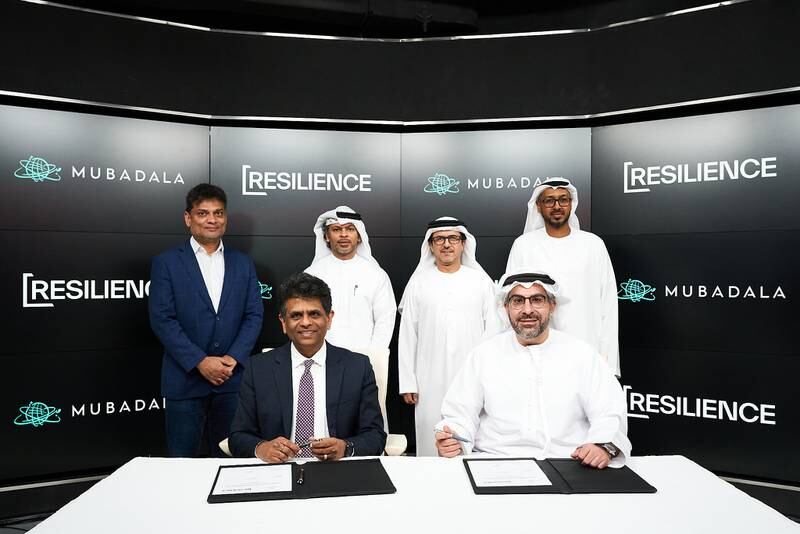 Badr Al Olama executive director, UAE Clusters at Mubadala (R) and Rahul Singhvi, chief executive of Resilience, at the signing ceremony. Photo: Mubadala