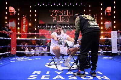 WBC heavyweight world champion Fury gets his hands wrapped by trainer Sugar-Hill Steward. Getty Images