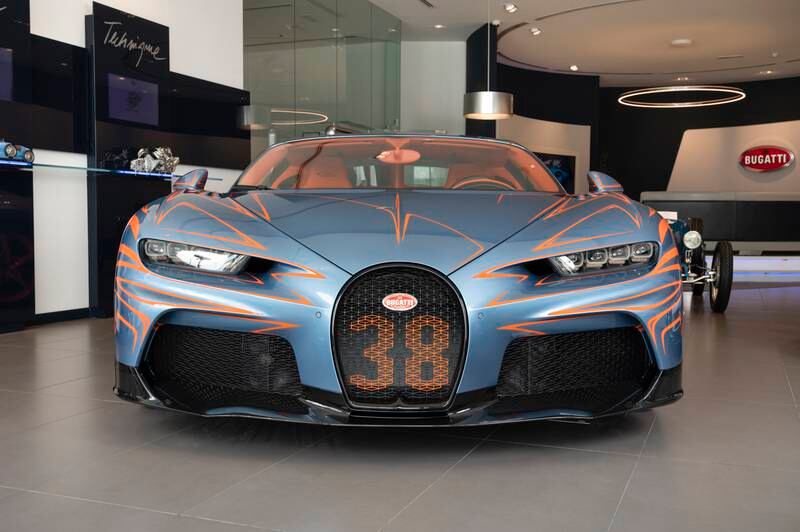 The number 38 emblazoned on the grille of the orange Super Sport.