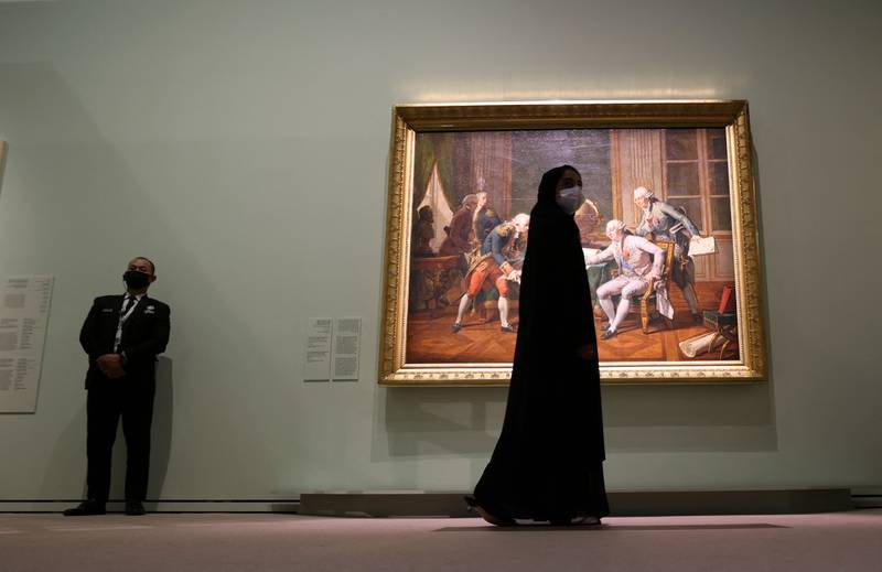 Visitors tour the exhibition 'Versailles and the World' at the Louvre Abu Dhabi. AFP