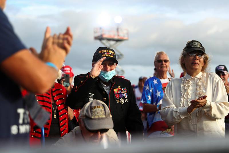 A World War II veteran salutes during U.S. President Donald Trump's campaign rally at The Villages Polo Club in The Villages, Florida, U.S. REUTERS