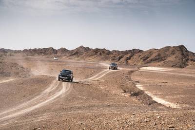 Review: We Tackled the Dunes of Dubai in the Land Rover Defender 130 – Robb  Report