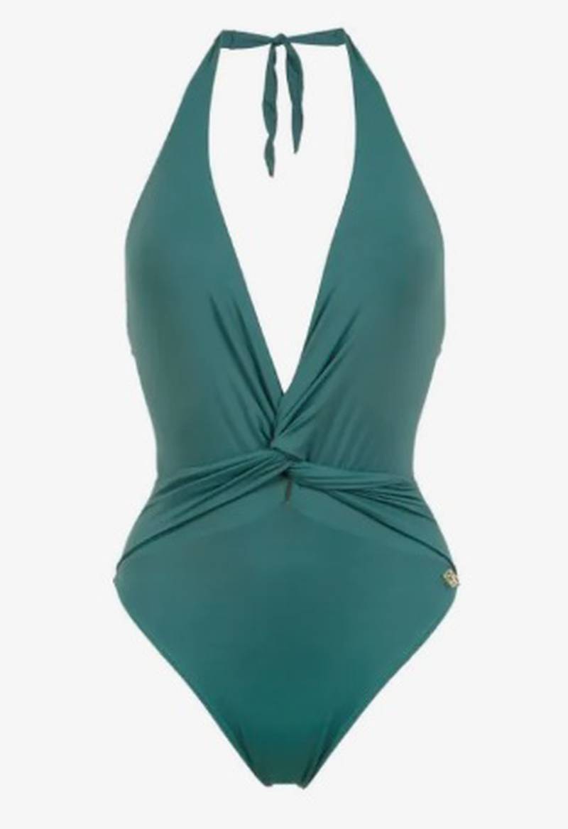 In rich, dark sea green, this one-piece from global fashion swimwear brand Brigitte adds a sleek twist front to a contemporary design, it is also available in other colours; 
Dh770, Brigitte at farfetch.com. Photo: Farfetch