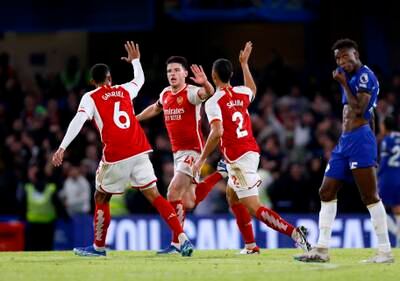 Arsenal's Declan Rice celebrates with his teammates after scoring to make it 2-1. PA