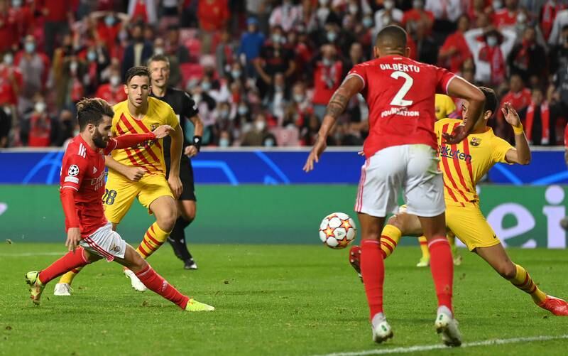 Benfica's Rafa Silva scores his sides second goal. Getty