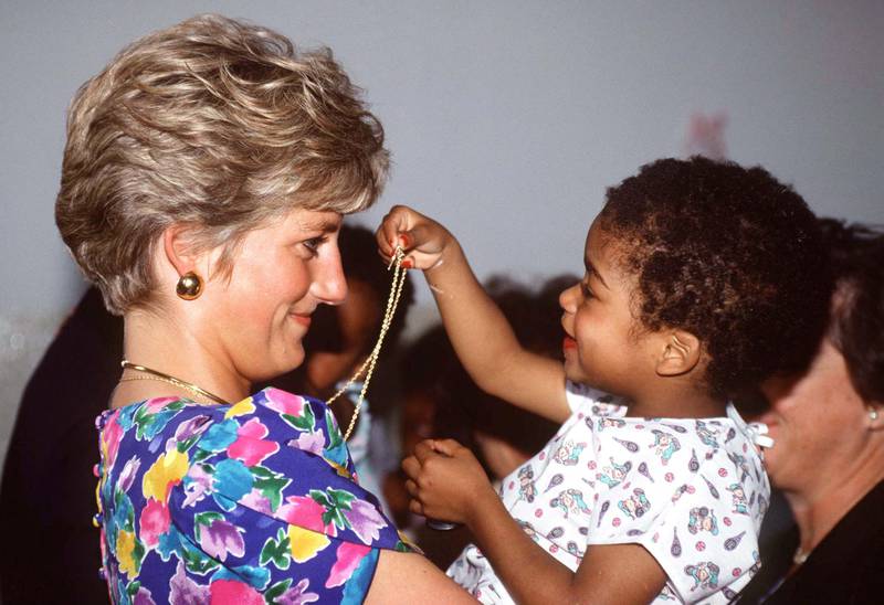 Princess Diana had a soft spot for children and was often photographed interacting with them. Getty Images