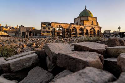 Al Nuri mosque, which was heavily damaged by ISIS fighters in 2017 during the battle by Iraqi forces to retake Mosul, and is currently being restored. it is believed the mosque was first built there in the 12th century. AFP