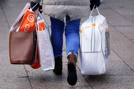 File photo dated 26/11/21 of a woman carrying several shopping bags. September recorded the slowest retail sales growth since shops reopened post-Covid due to a combination of inflation, economic crisis and an unexpected bank holiday, figures show. Total in-store and online sales increased by just 2.8% in September on last year, according to BDO's High Street Sales Tracker (HSST). Issue date: Friday October 7, 2022.