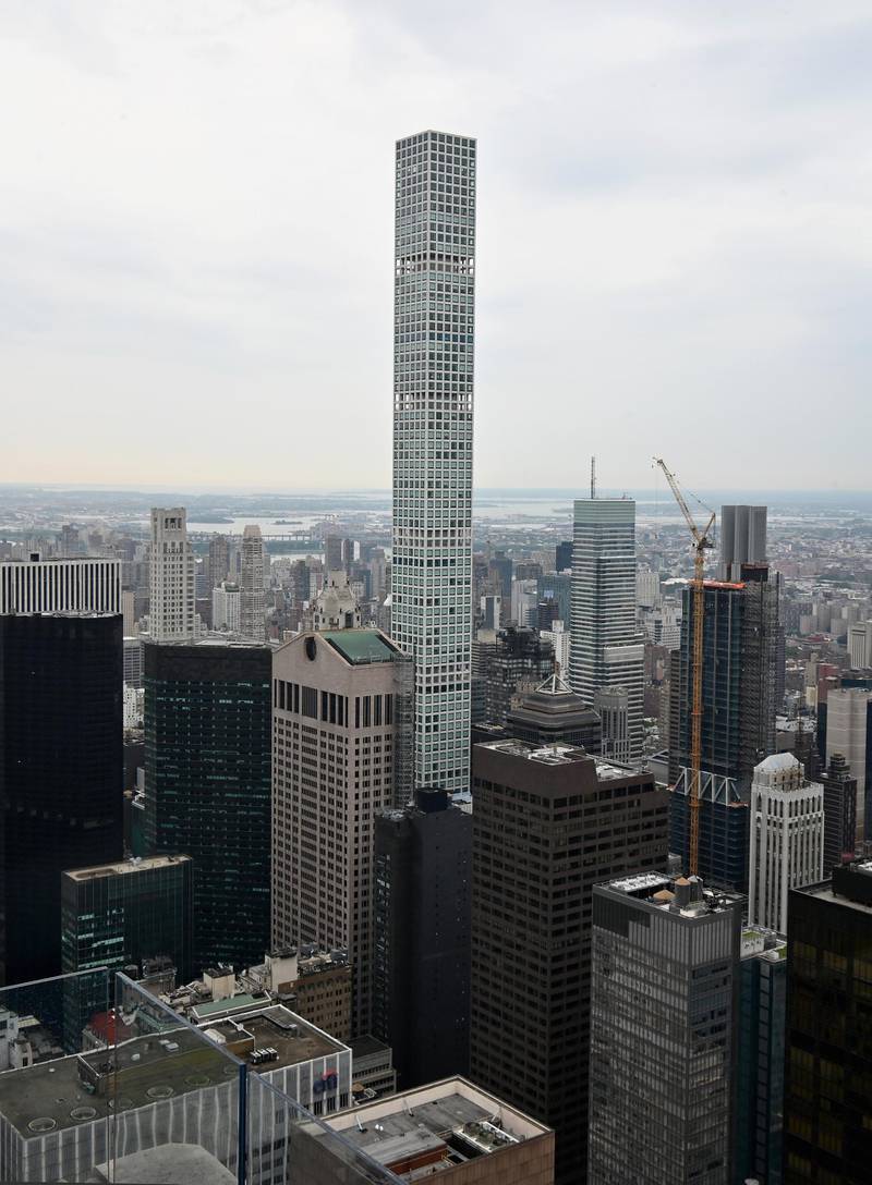A view of 432 Park Avenue known as the "Matchstick Building" from Top of The Rock observation deck as it reopens on August 6, 2020 in New York City. The Matchstick  is the tallest residential building in the western hemisphere at 1,396 feet (425 meters) high. - The Top of the Rock was forced to temporarily close in March to help limit the spread of COVID-19. However, the Observation Deck at Rockefeller Center has the benefit of being one of the largest in New York City, with more than 9,500 square feet (883 square meters) of outdoor deck space. (Photo by Angela Weiss / AFP)