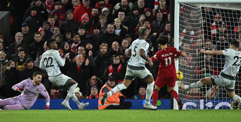 Liverpool striker Mohamed Salah scores his team's second goal. AFP