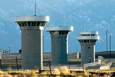 Guard towers loom over the administrative maximum security facility, the highest security area at the Federal Prison in Florence, Colo., Wednesday, Feb 21, 2007. U.S. Attorney General Alberto Gonzales toured the prison, known as the Supermax, with Colorado state and federal legislators following complaints by staff and local residents about the level of security at the facility. (AP Photo/Pueblo Chieftain, Chris McLean)