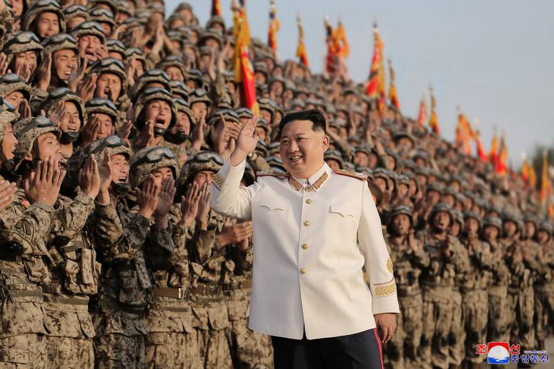 North Korean leader Kim Jong Un, seen meeting troops who took part in the country's 90th anniversary military parade, has vowed to speed up development of the country's nuclear arsenal. KCNA/Reuters