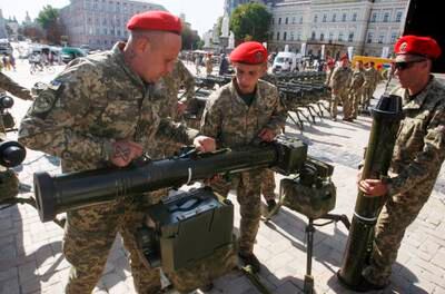 Ukrainian soldiers with Stugna-P anti-tank weapons during a military exhibition in 2018. Getty Images