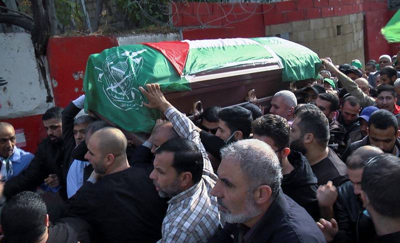 Men carry the coffin of a man who was killed in an explosion that occurred on Friday night in the Palestinian camp of Burj Al Shemali. Reuters