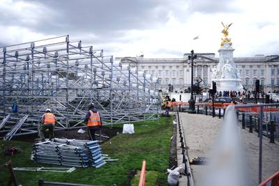 Temporary stands are constructed on The Mall outside Buckingham Palace, central London. PA